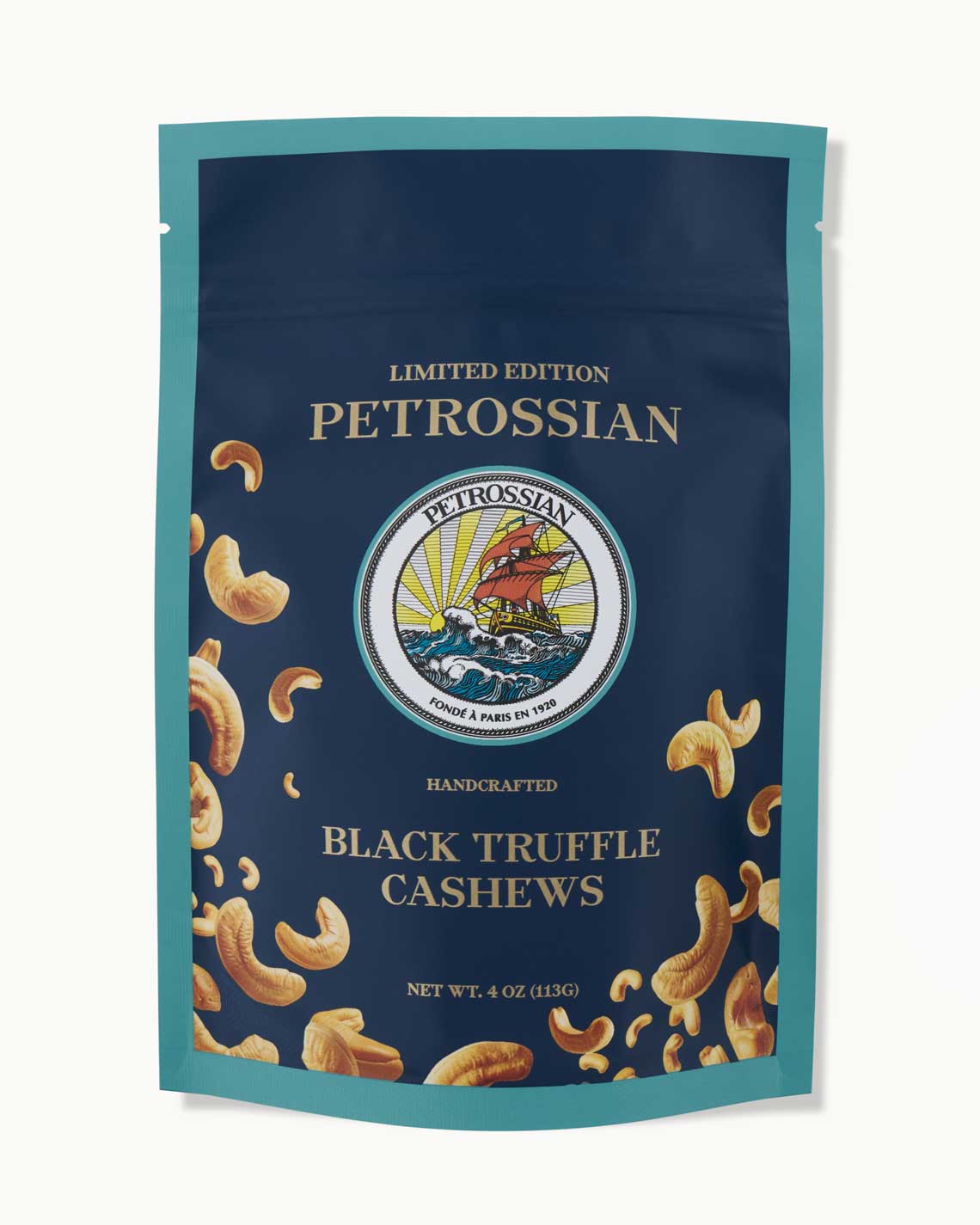 a navy blue bag with teal trim and the image of tossed cashews sits on a white background.