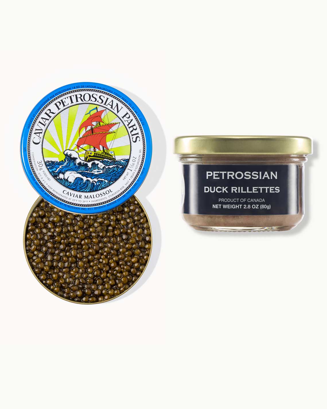 a top-down image of a blue Petrossian tin of green caviar and a glass jar of Duck Rillettes both sit on a white background