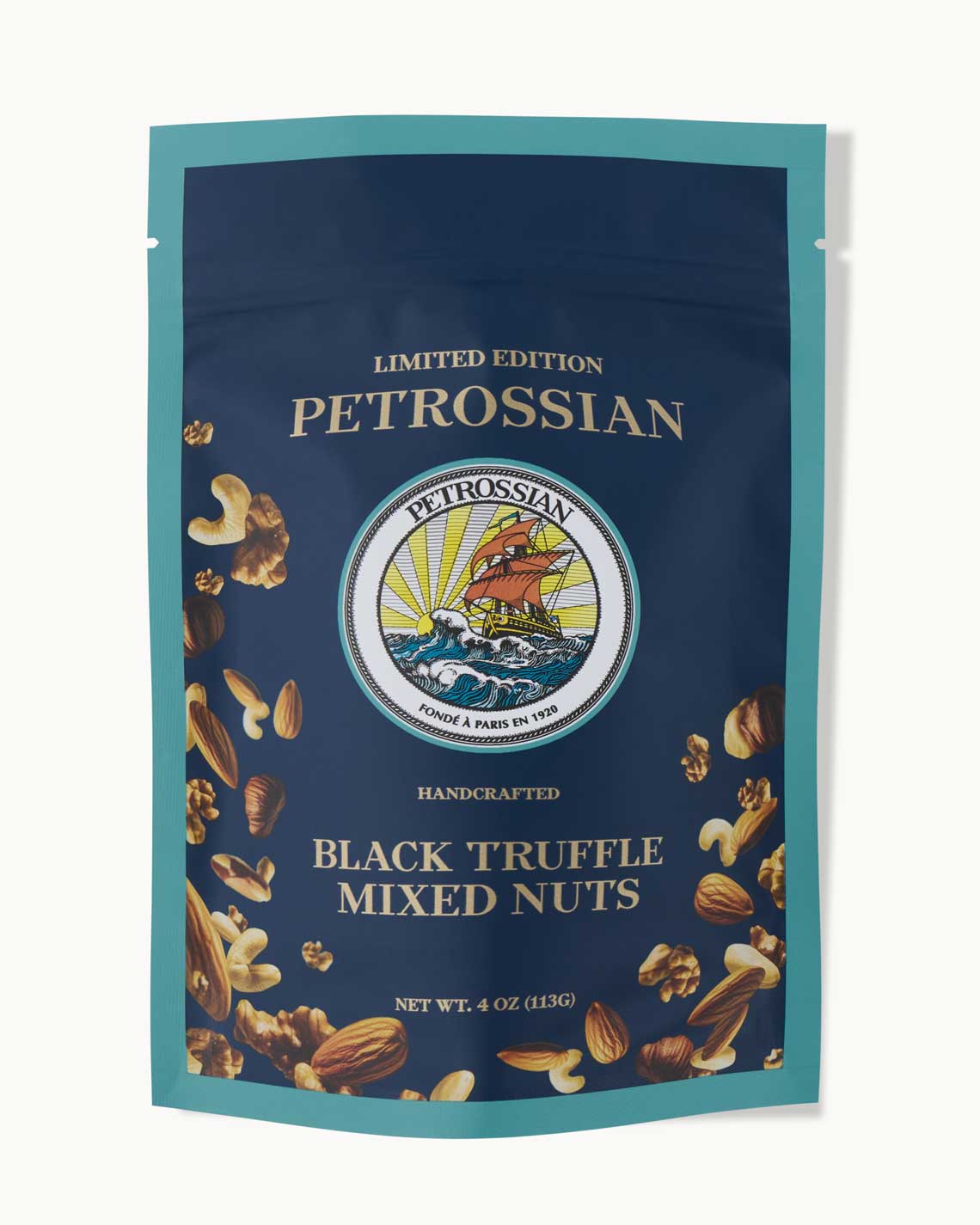 a navy blue bag with teal trim, a Petrossian logo and the image of tossed cashews, almonds and pecans on it. It is on a white background.