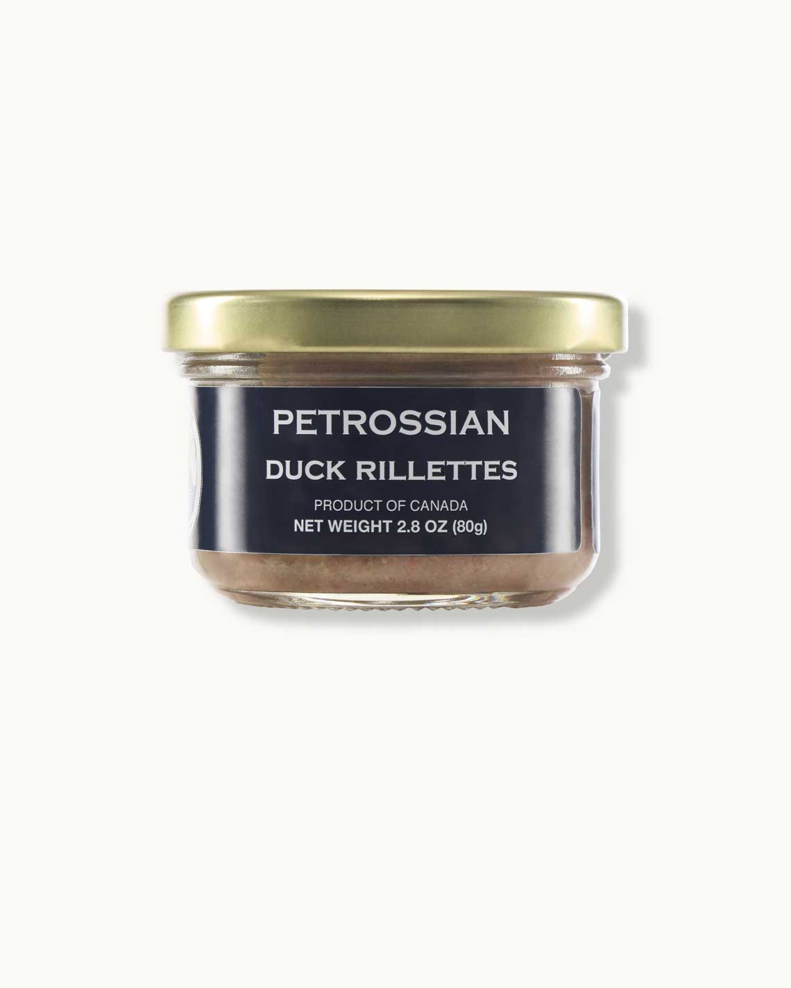 a shirt glass jar with a brass top, filled with beige duck pate