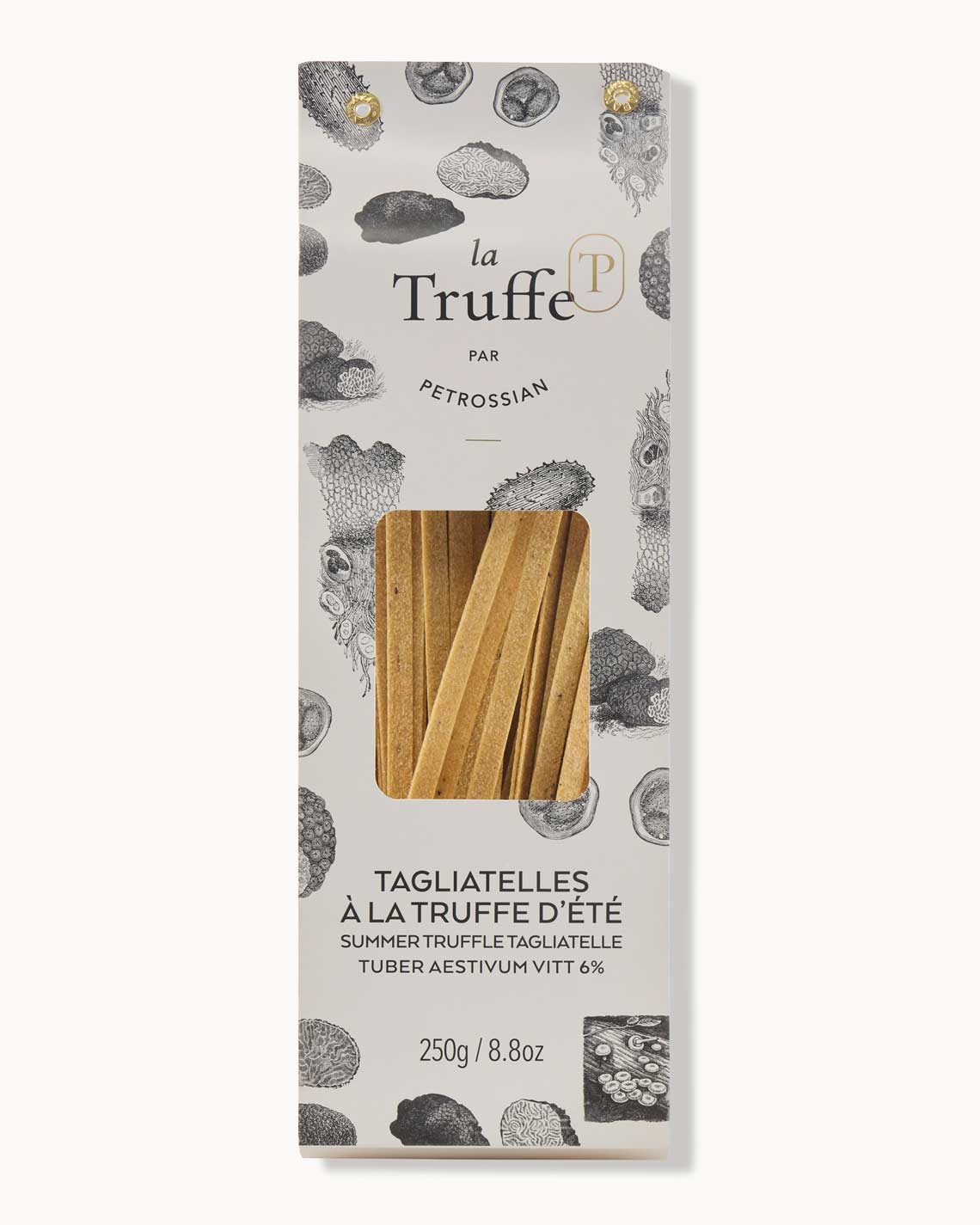 a tall white box of "le truffe" truffled tagliatelle lies on a white background.