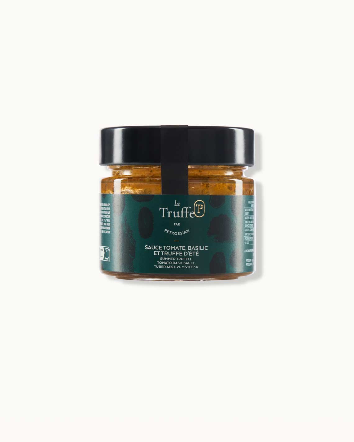 a short glass jar with a dark green "la truffe" label and a black lid sits on a white background. It is filled with vibrant orange tomato basil sauce.