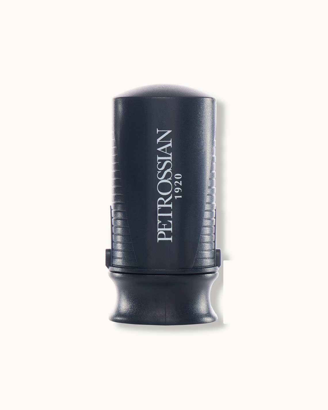 a navy blue Petrossian wine-saver sitting on a white background.