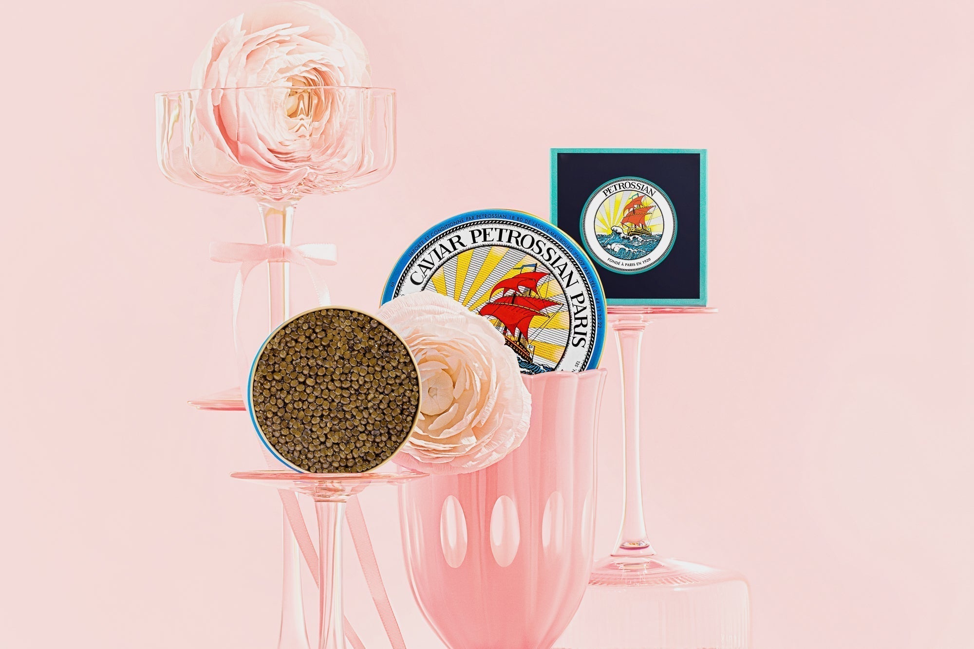 caviar with spring flowers in a blue Petrossian tin