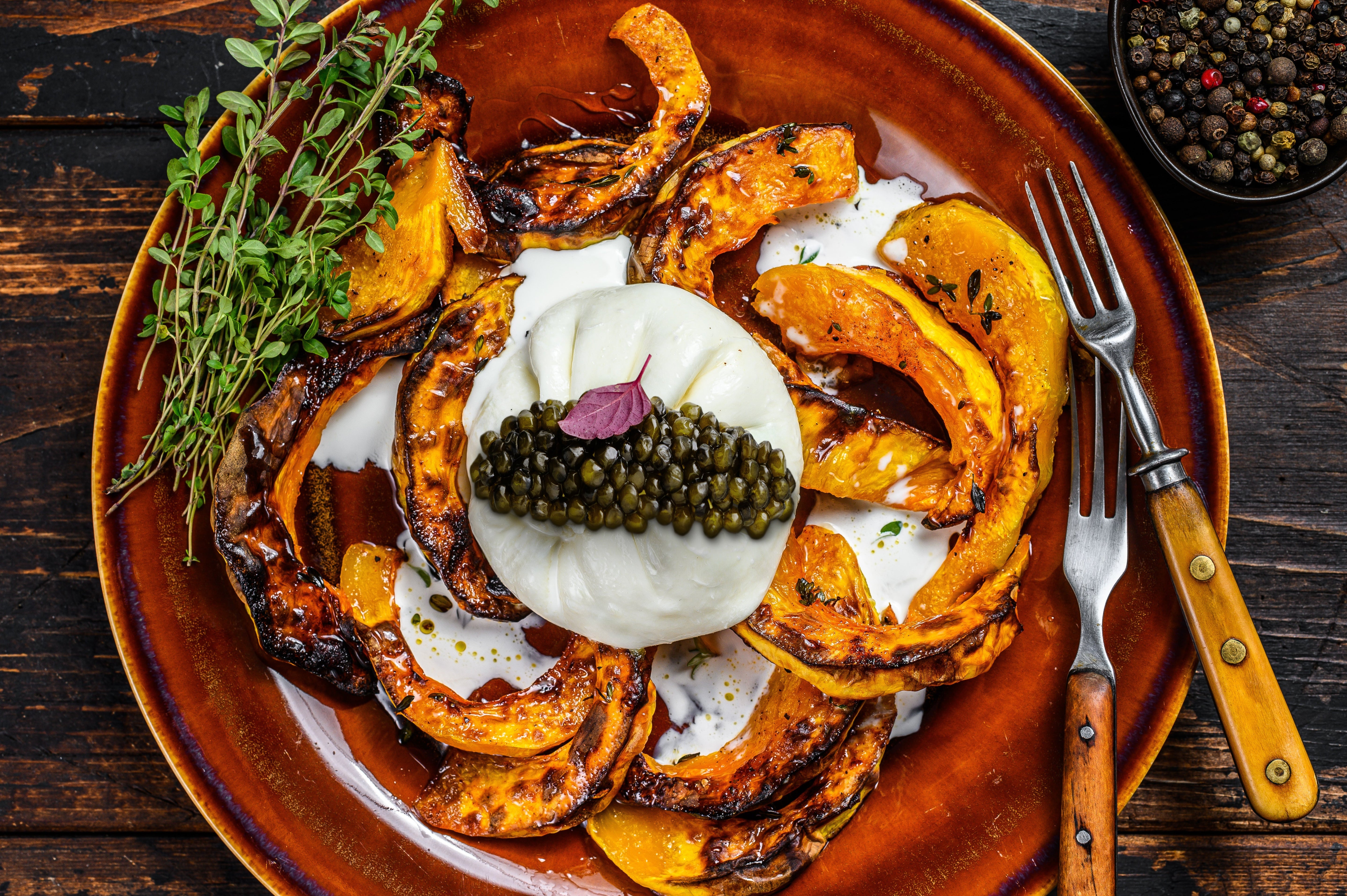 burrata over roasted delicata squash with Petrossian caviar