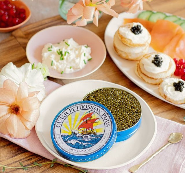 caviar at spring parties and gatherings surrounded by flowers on a table