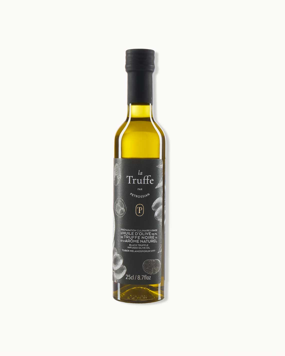 a thin glass bottle yellow-green truffle olive oil with a black label